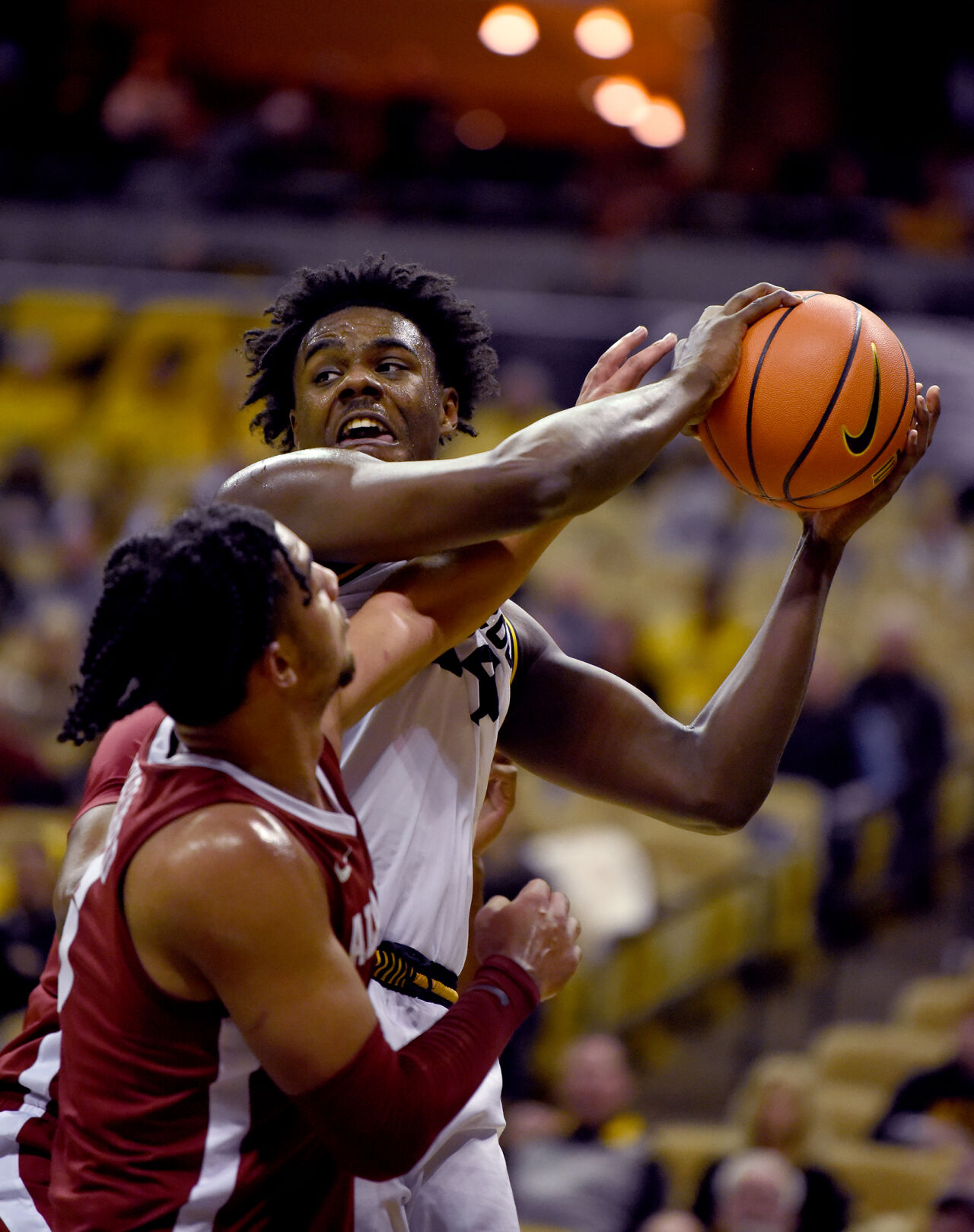 Missouri forward Kobe Brown attempts to pass the ball